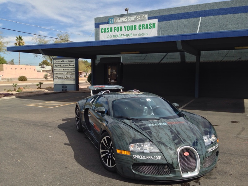 Bugatti Veyron under canopy at Campus Body Salon Ltd. (Collision Center), Tempe, AZ