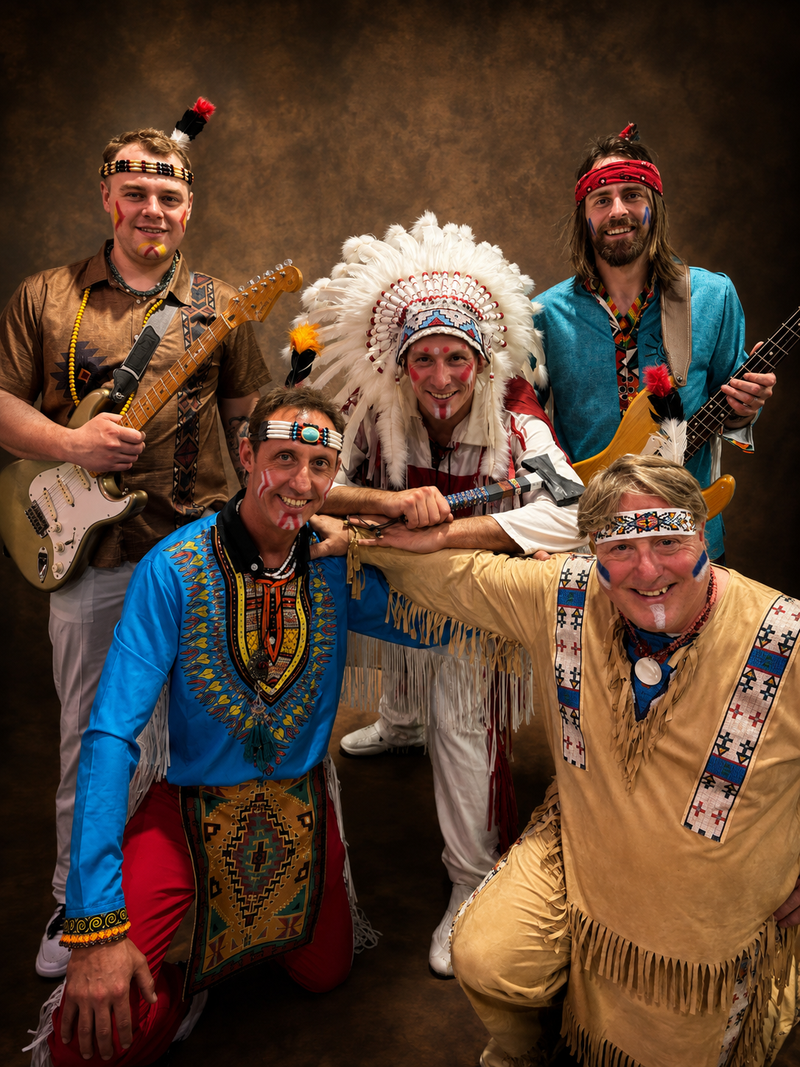 Full group studio portrait of The New Indians Showband in complete stage regalia