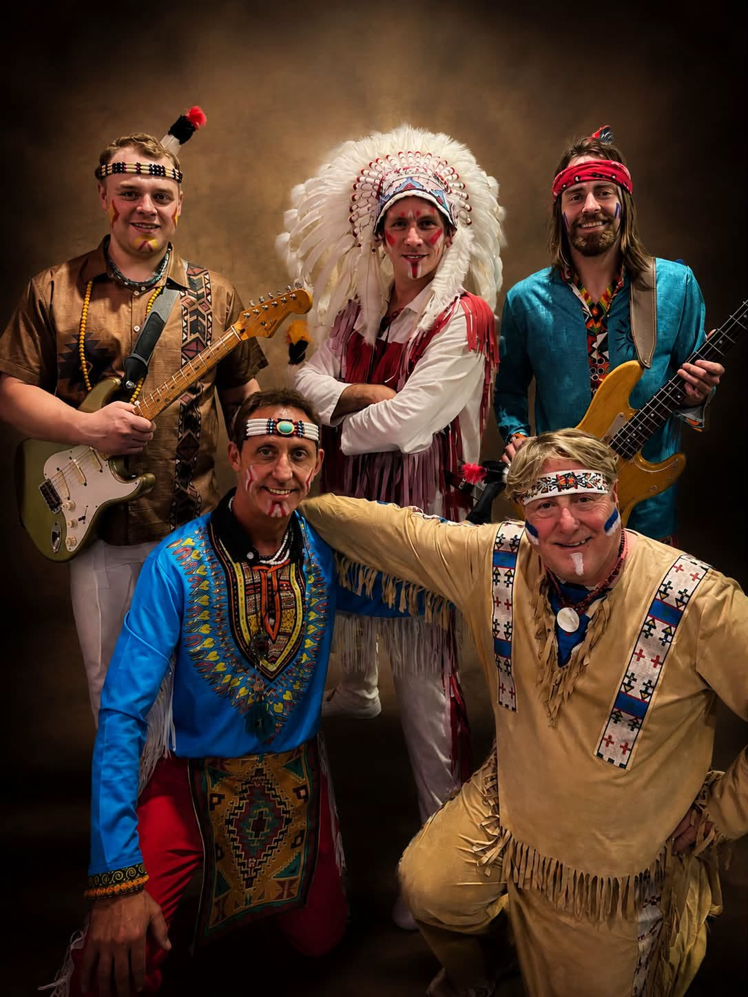 The New Indians Showband — all five members in showband stage regalia on brown backdrop