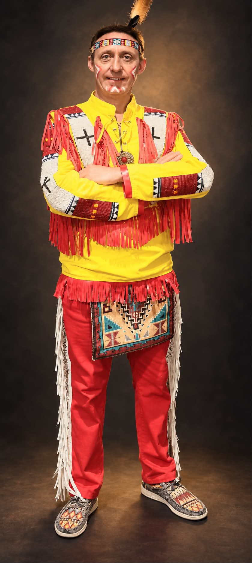 Standing Bear of The New Indians Showband in full-length yellow and red stage regalia