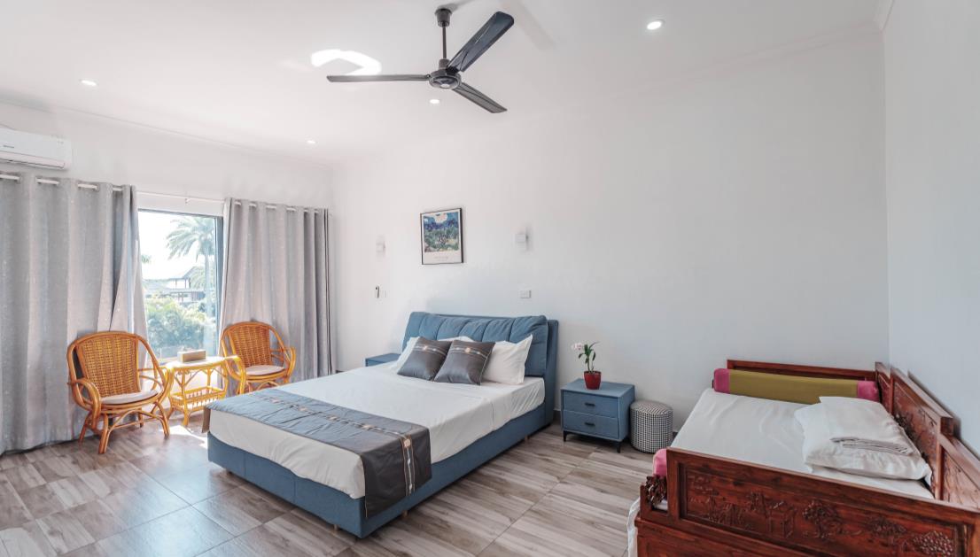 Room 203 — king bed plus a single bed