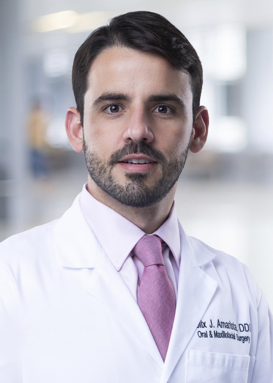 Felix J. Amarista in a white coat
