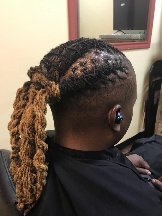 Intricate flat-twist loc styling with two-tone honey blonde ponytail by Jennifer J at LOC & Curl Xpress ATL Salon in Decatur, GA