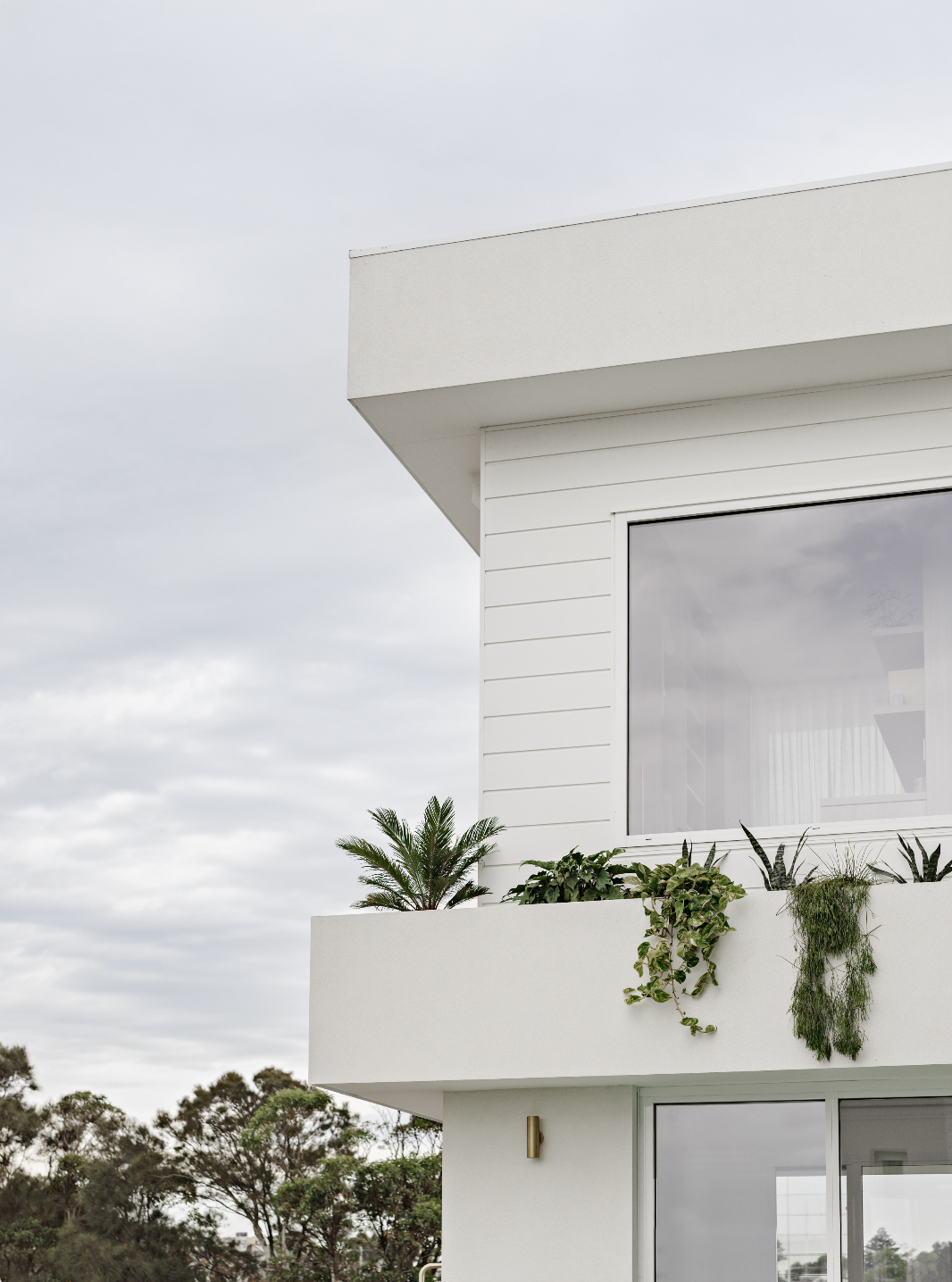 Clean cladding work and window frames on an upper level