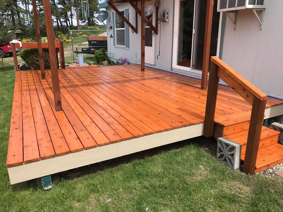 Complete stained deck and custom wood handrail completed by Rivercrest Home Services LLC in Wenatchee WA