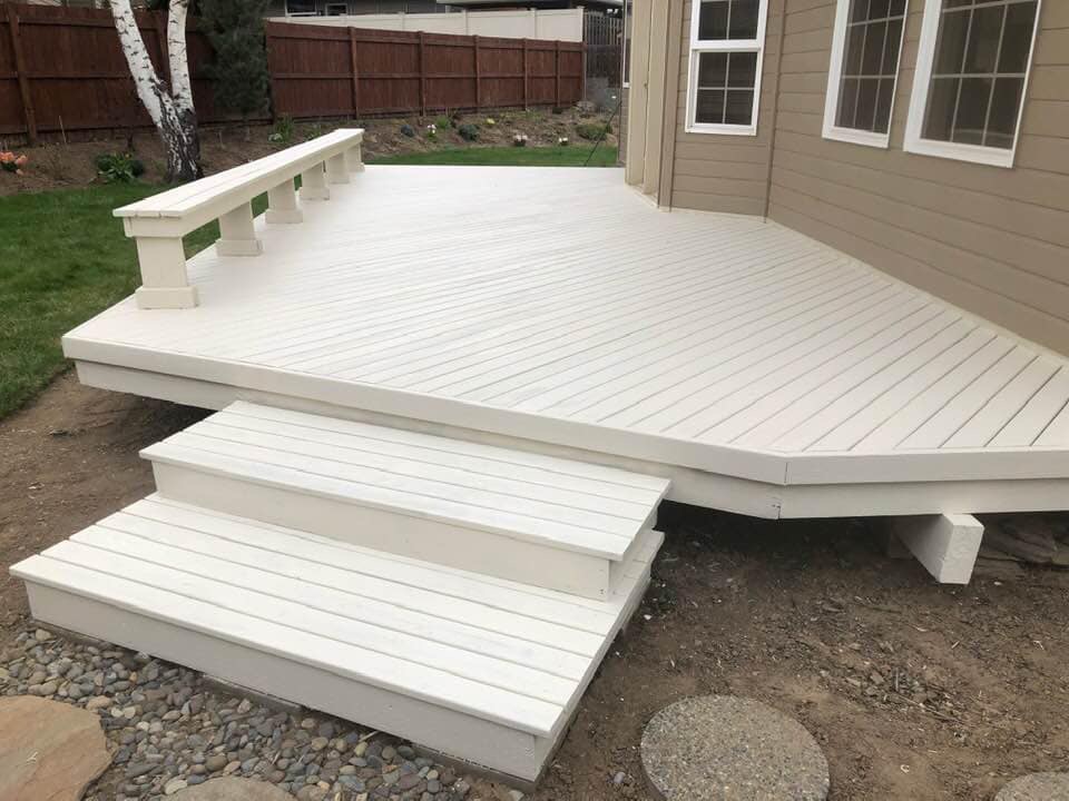 Solid painted deck restoration and integrated bench finish by Rivercrest Home Services LLC in Wenatchee WA