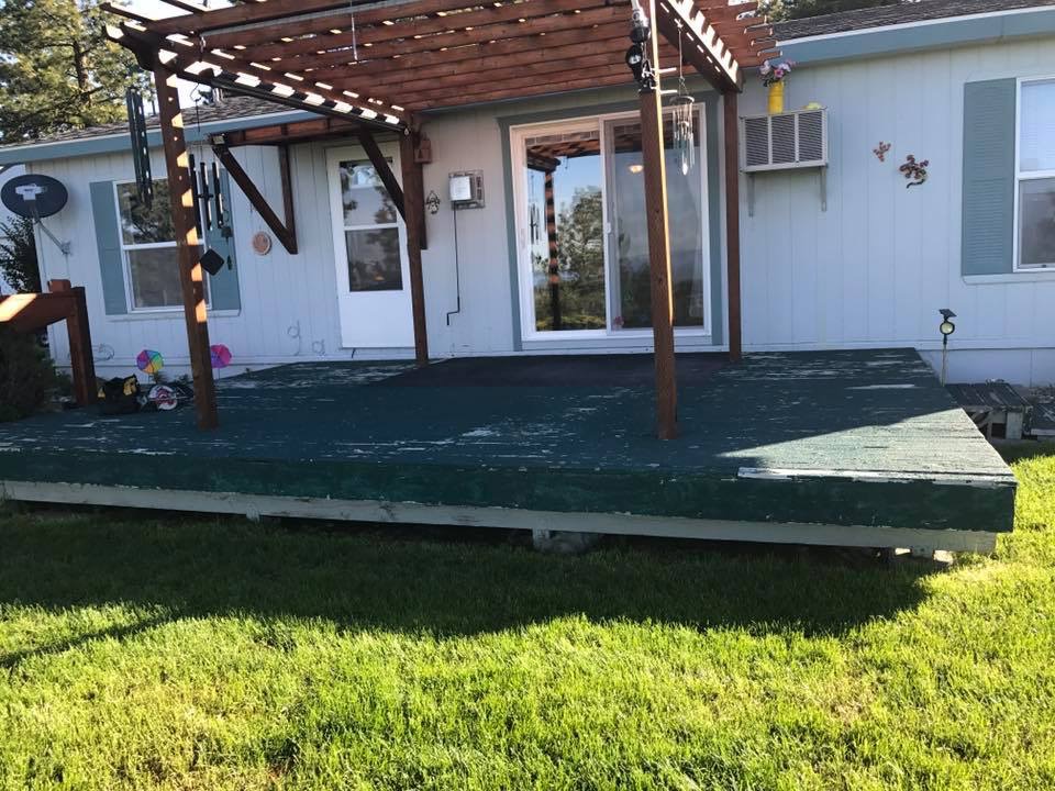 Deck and pergola structure awaiting complete surface restoration by Rivercrest Home Services LLC in Wenatchee WA