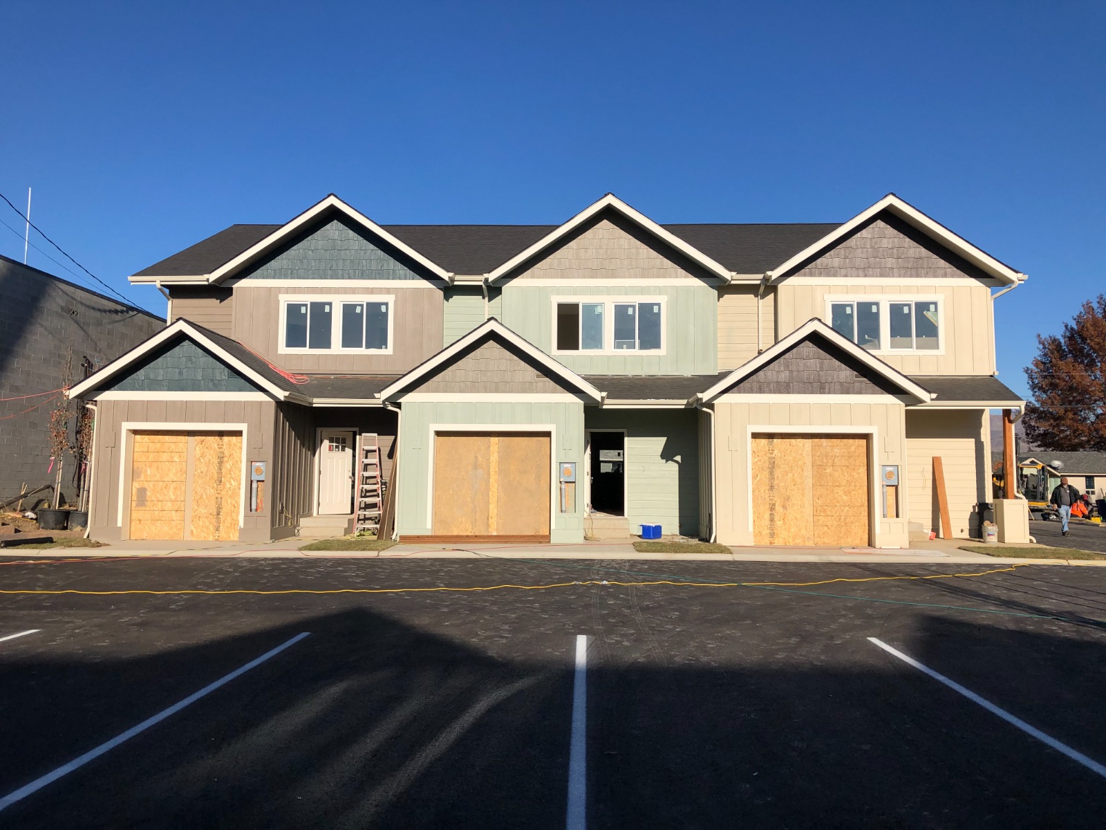 Multifamily townhome exterior siding painting completed by Rivercrest Home Services LLC in Wenatchee WA