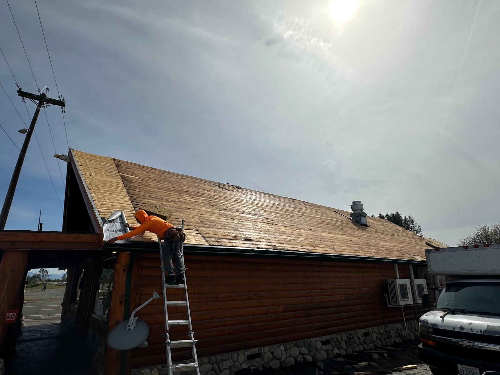 Log Cabin Style Roof Tear-Off & Synthetic Underlayment Barrier Installation completed by Target Home Solutions in Highlands, CA