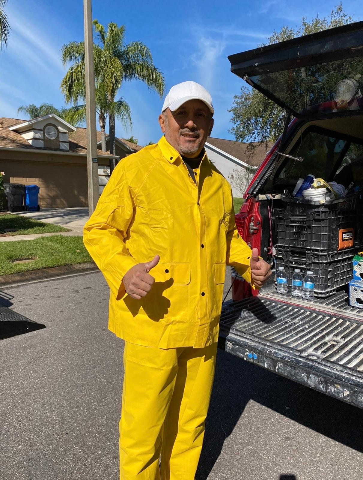 Owner John Granda with work truck in Land O' Lakes FL ready with commercial protective gear for high-pressure exterior washing