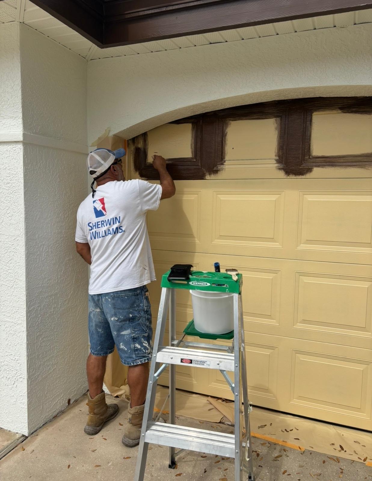 Wood-grain staining on garage doors by Ecuaconstruction Corp in Tampa FL