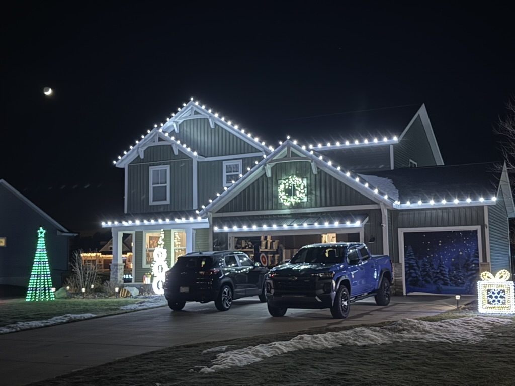 Aurora Premier Lighting installation glowing after dark