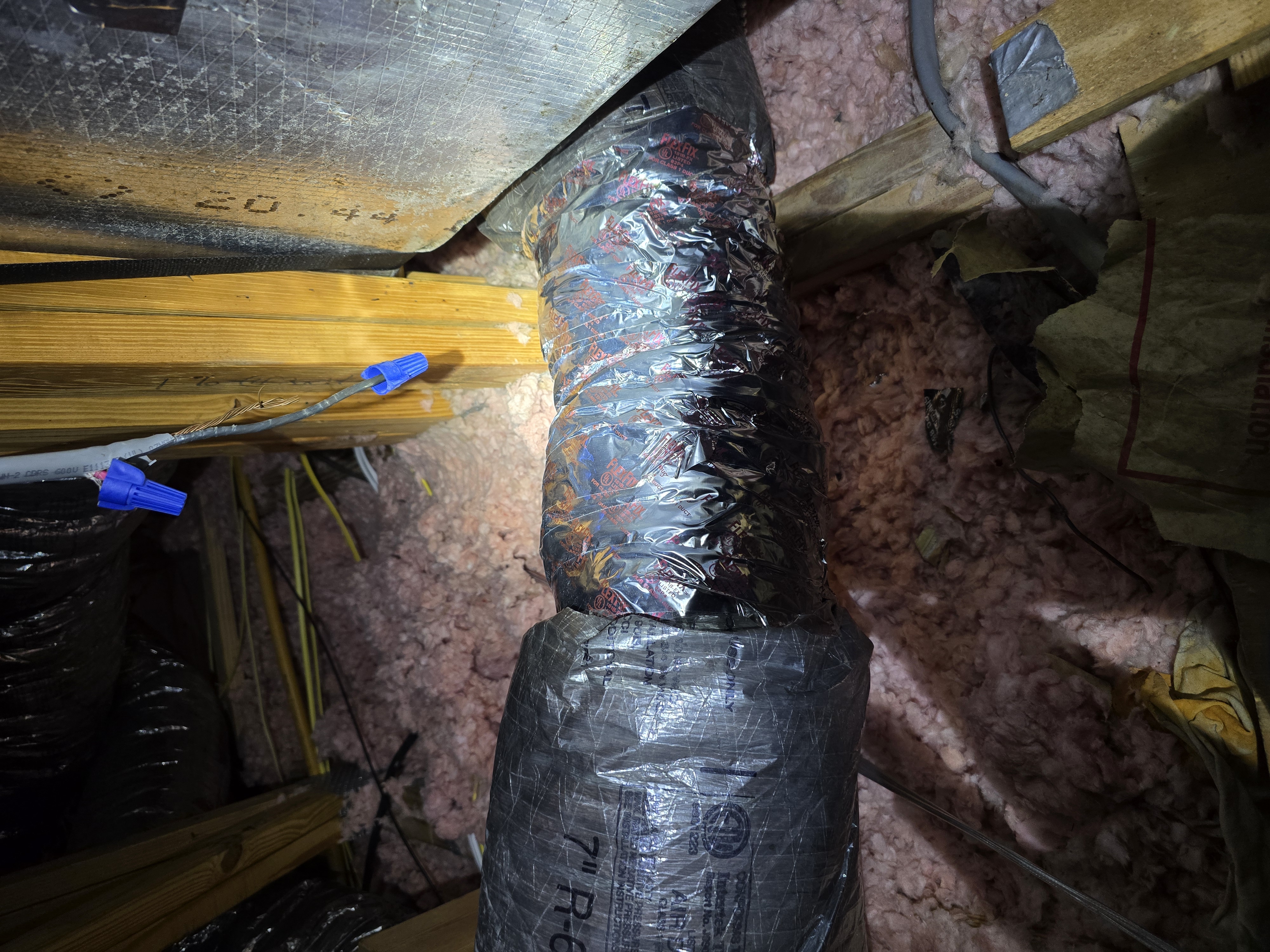 Fully re-sleeved, foil-taped and mastic-sealed attic ductwork after restoration