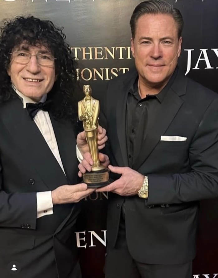 Jay sharing an award celebration