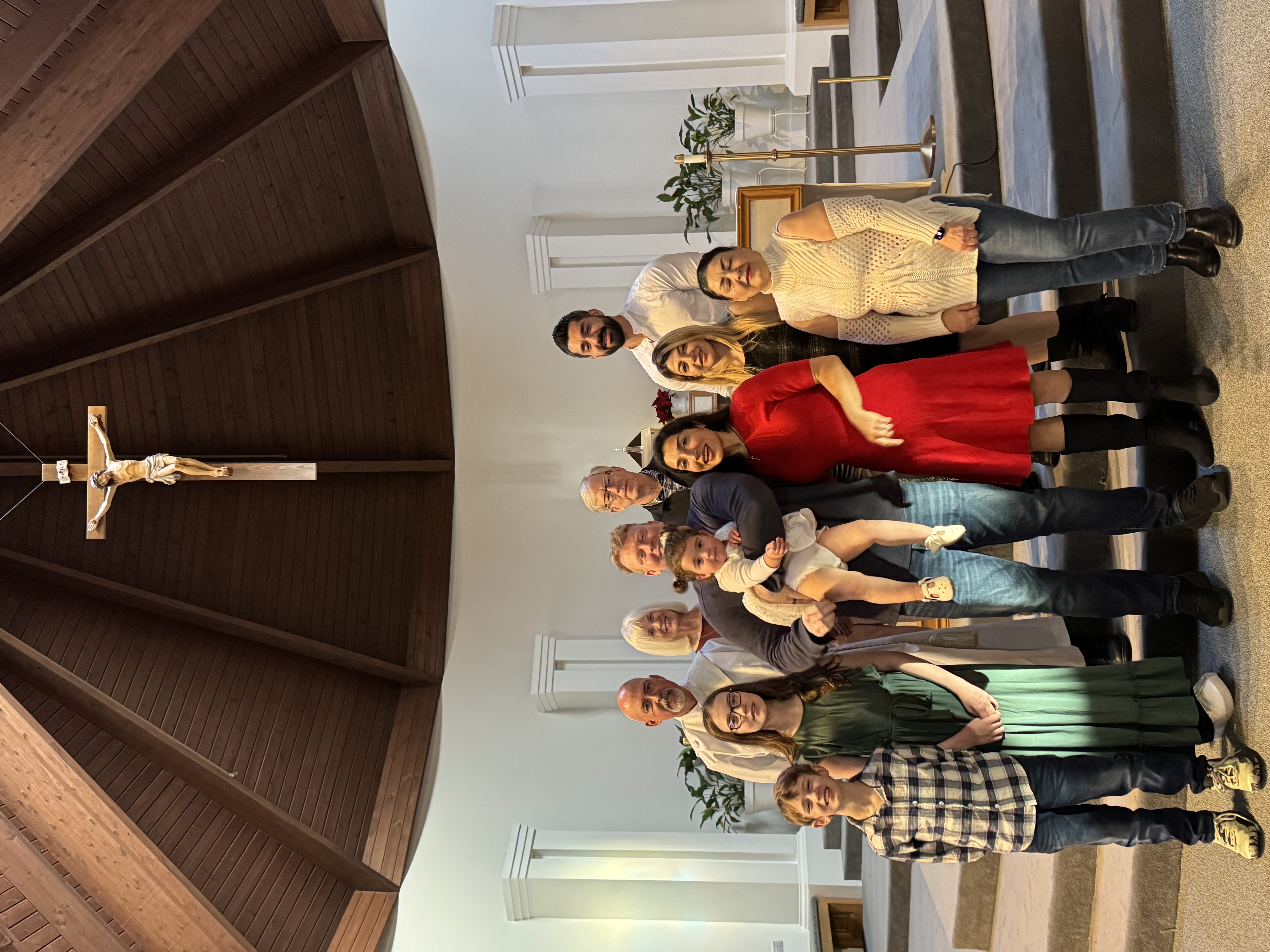 Holy Journey founders Kevin and Nasrin Krebs with their family in church