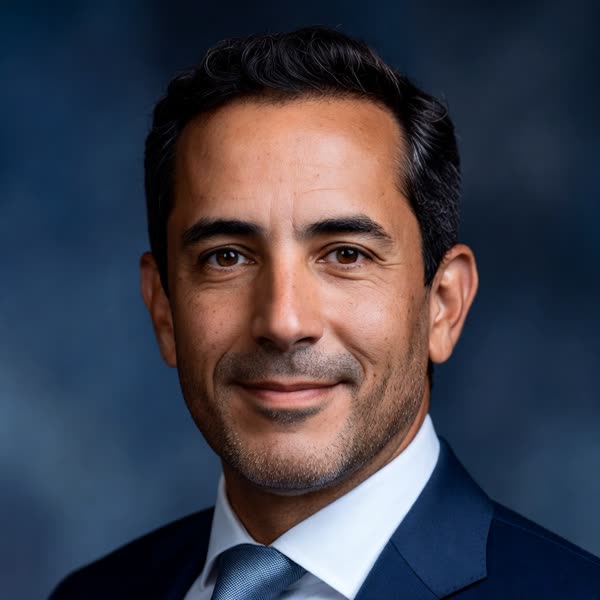 Portrait of Jude Thaddeus, Director of Client Success & Retention