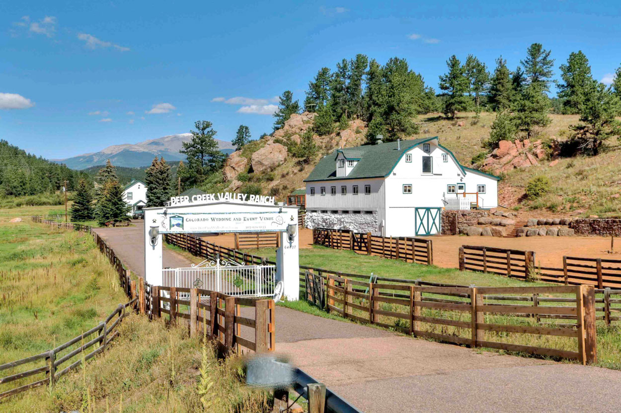 Sweeping meadow and mountain views at Deer Creek Valley Ranch