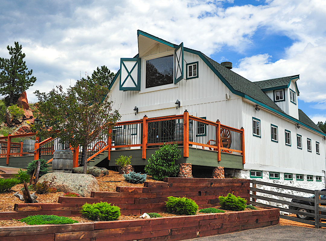 The rustic Barn reception venue at Deer Creek Valley Ranch