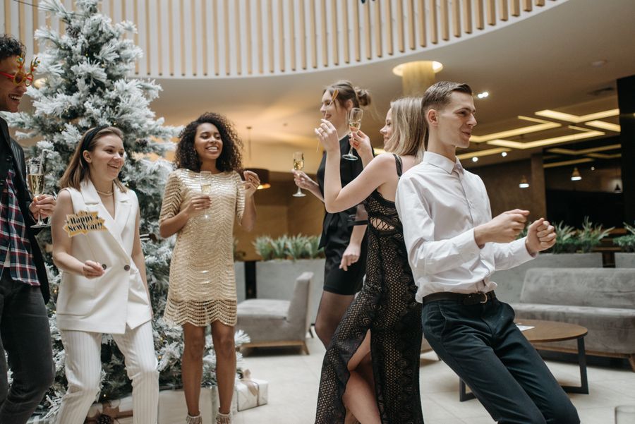 Colleagues dancing and celebrating at a corporate party
