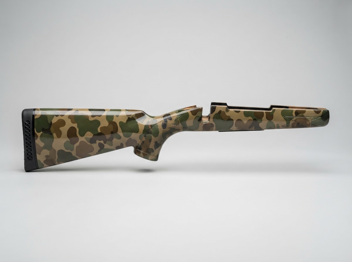 Bare wooden gun stock transformed with a camouflage hydrographic dip — Woodland Camo
