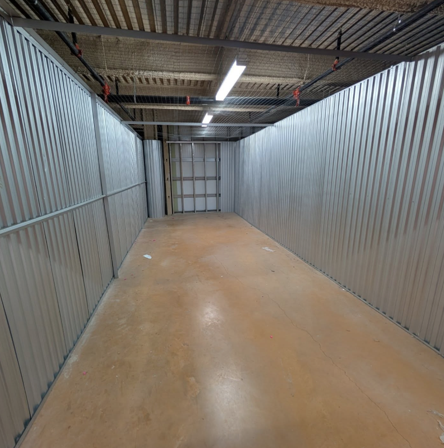 The same storage unit empty after cleanout.