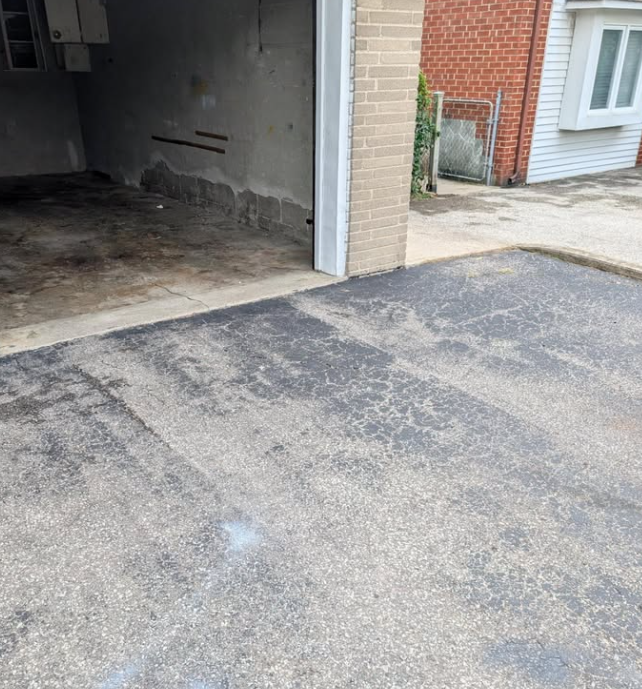 The same driveway clear after cleanup.