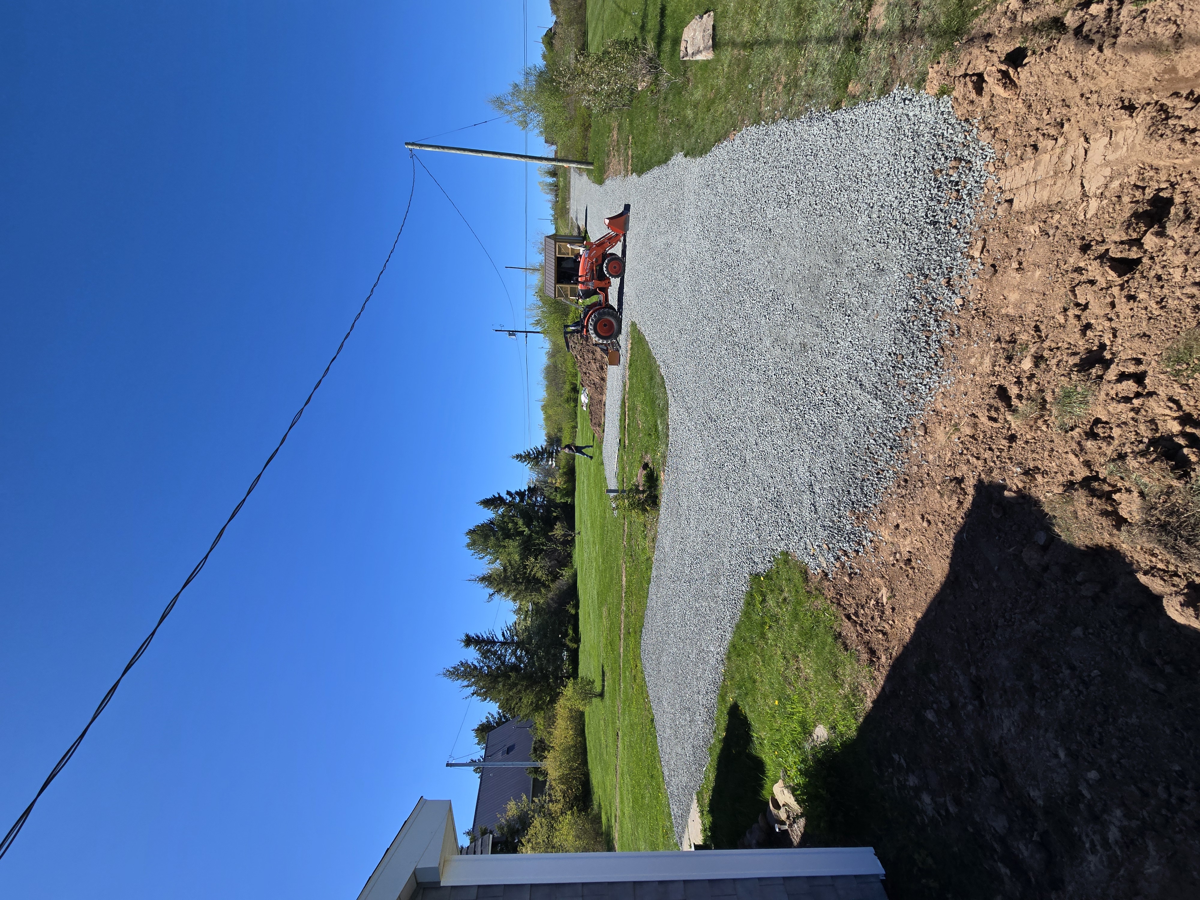 Gravel driveway construction and grading