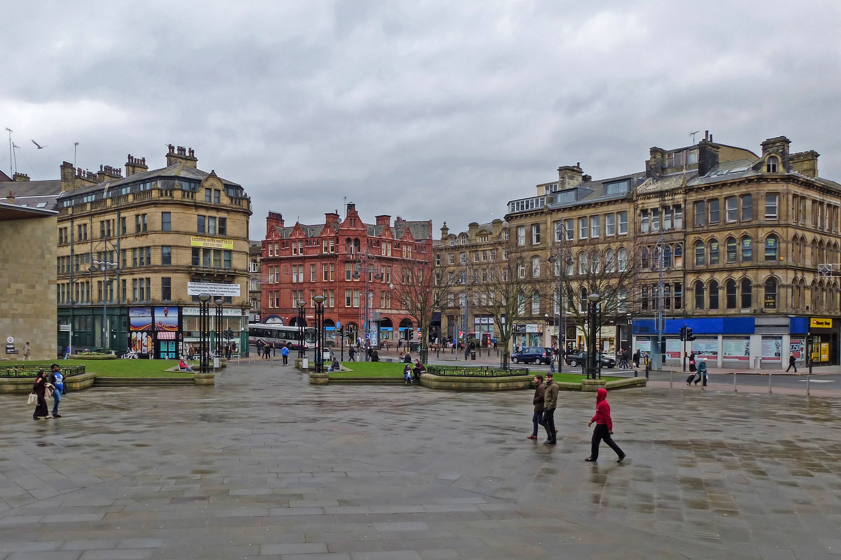 Bradford City Hall and Centenary Square at dusk — TGW Plastering Contractors serving Bradford