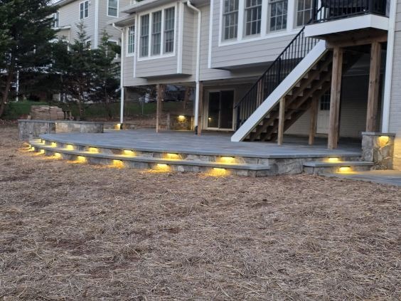 Raised patio terrace with step illumination