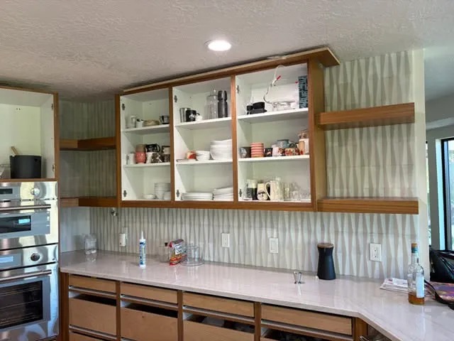 Custom Kitchen Cabinetry & Textured Geometric Tile Splash
