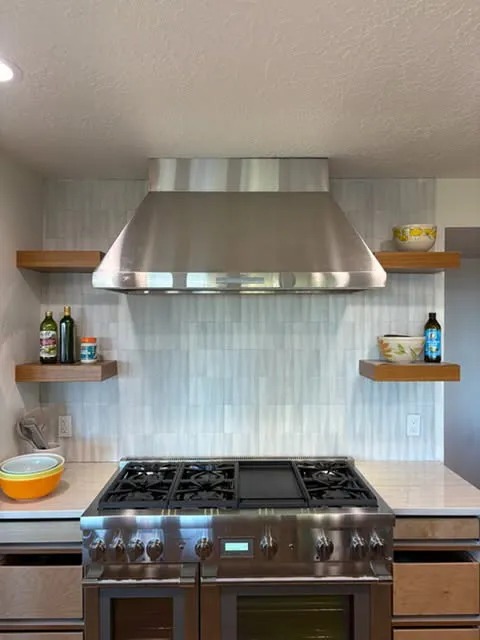 Gourmet Kitchen Hood & Vertical Tile Accent Wall