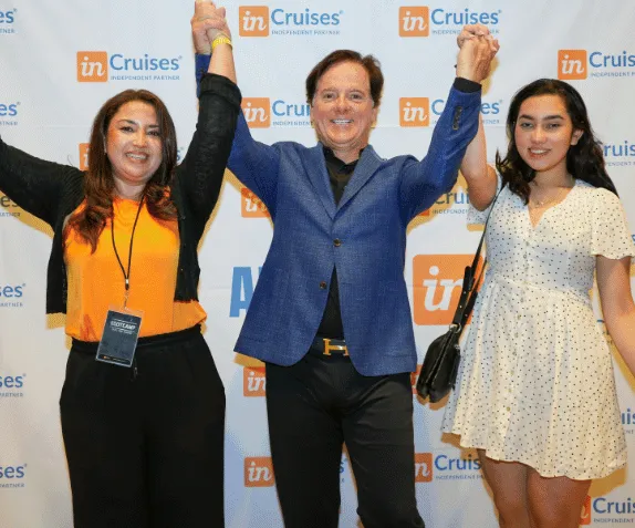 Marc Accetta celebrating with two members