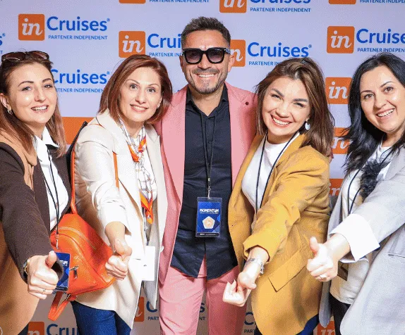 Members posing together at the photo wall