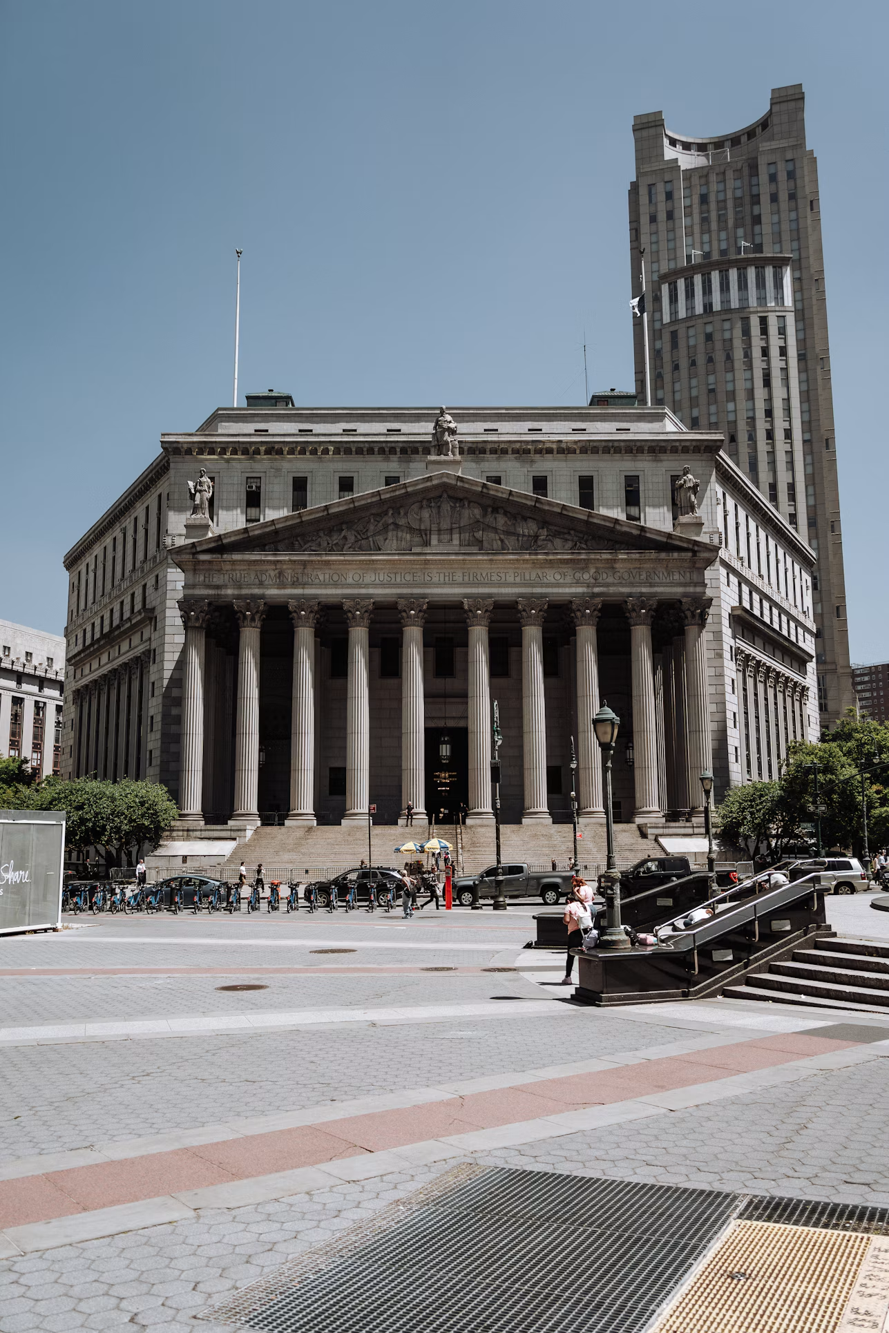 Courthouse columns representing judicial proceedings and legal case progression