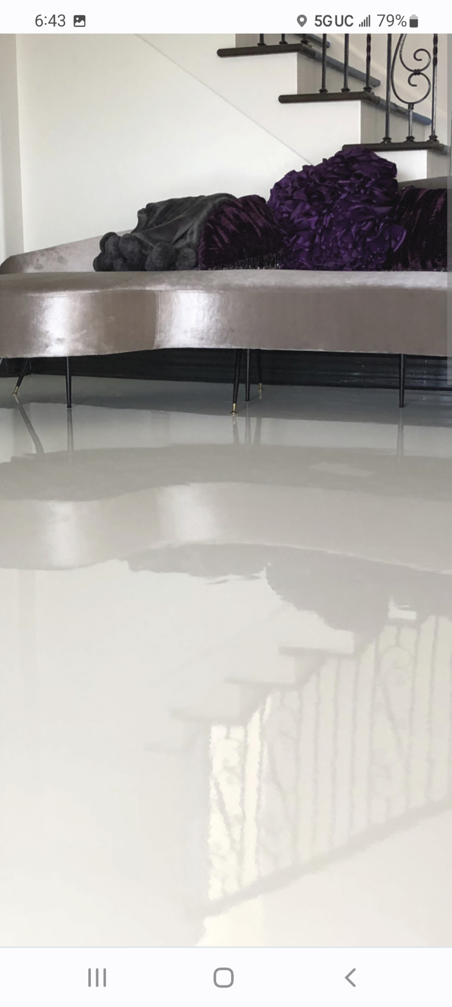 Hudson Epoxy Flooring completed ultra-smooth high-gloss off-white interior floor with mirror-like reflections of staircase and furniture