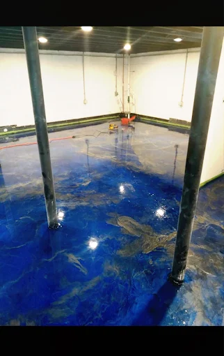 Hudson Epoxy Flooring completed deep oceanic blue metallic floor with high-gloss reflective sheen