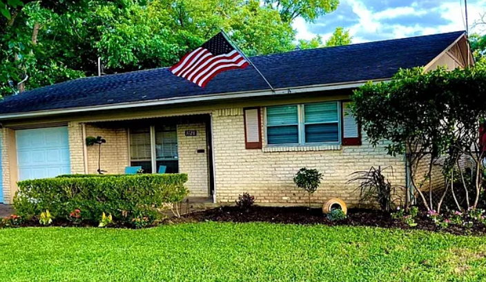 3728 Stattler Drive, Mesquite, TX — front exterior view with front lawn and flag