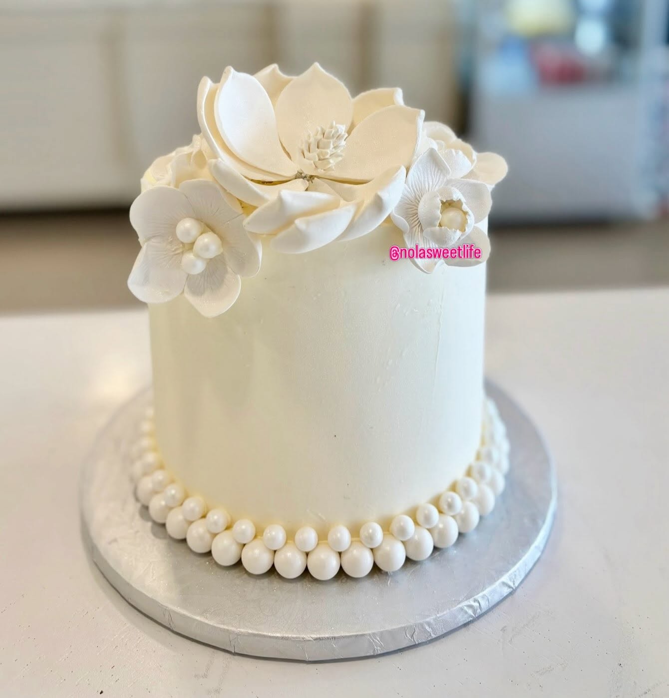 Artisan gourmet premium fillings and handcrafted magnolia sugar flowers