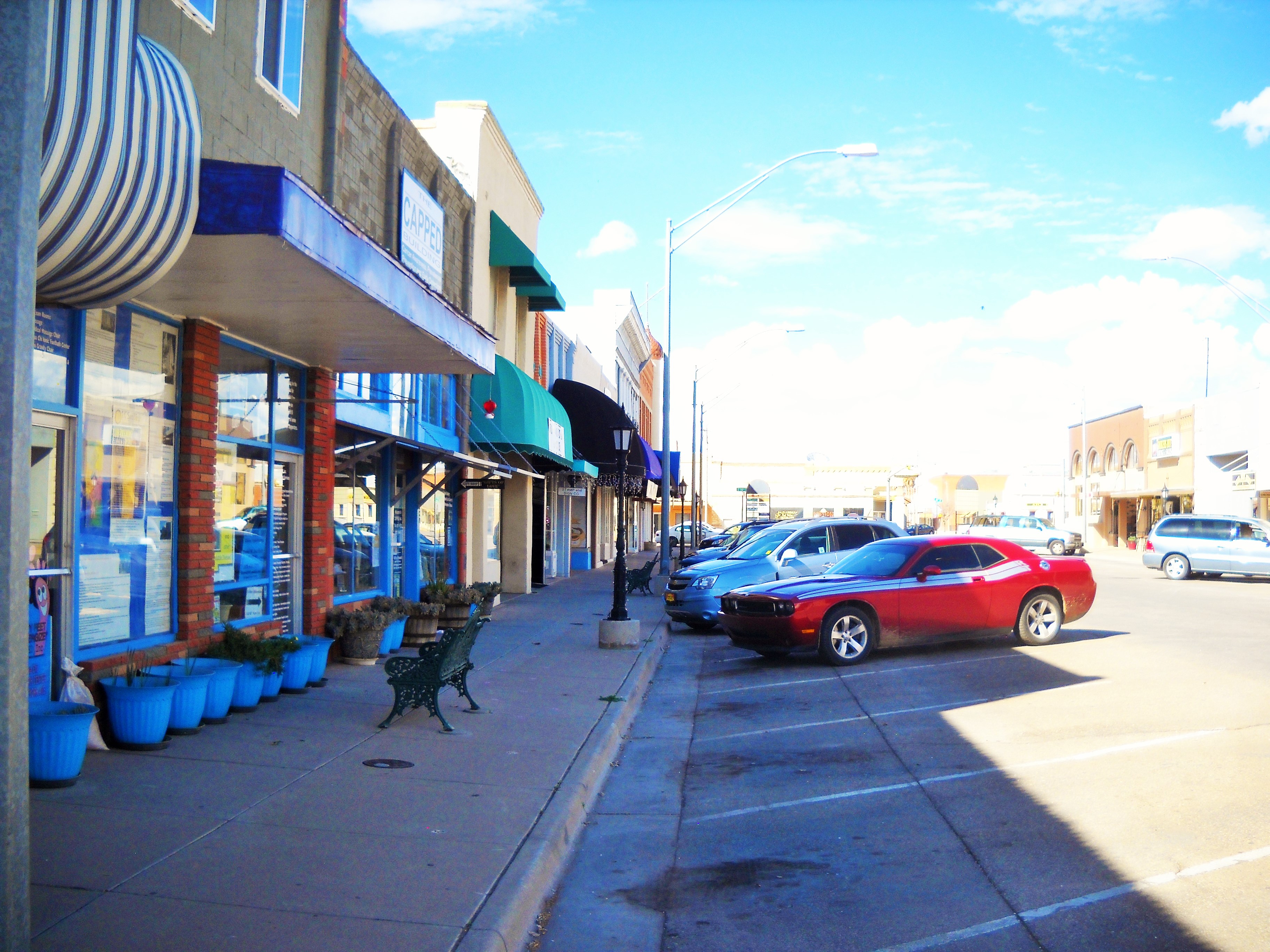 Storefronts and angle parking along New York Avenue in historic downtown Alamogordo, New Mexico