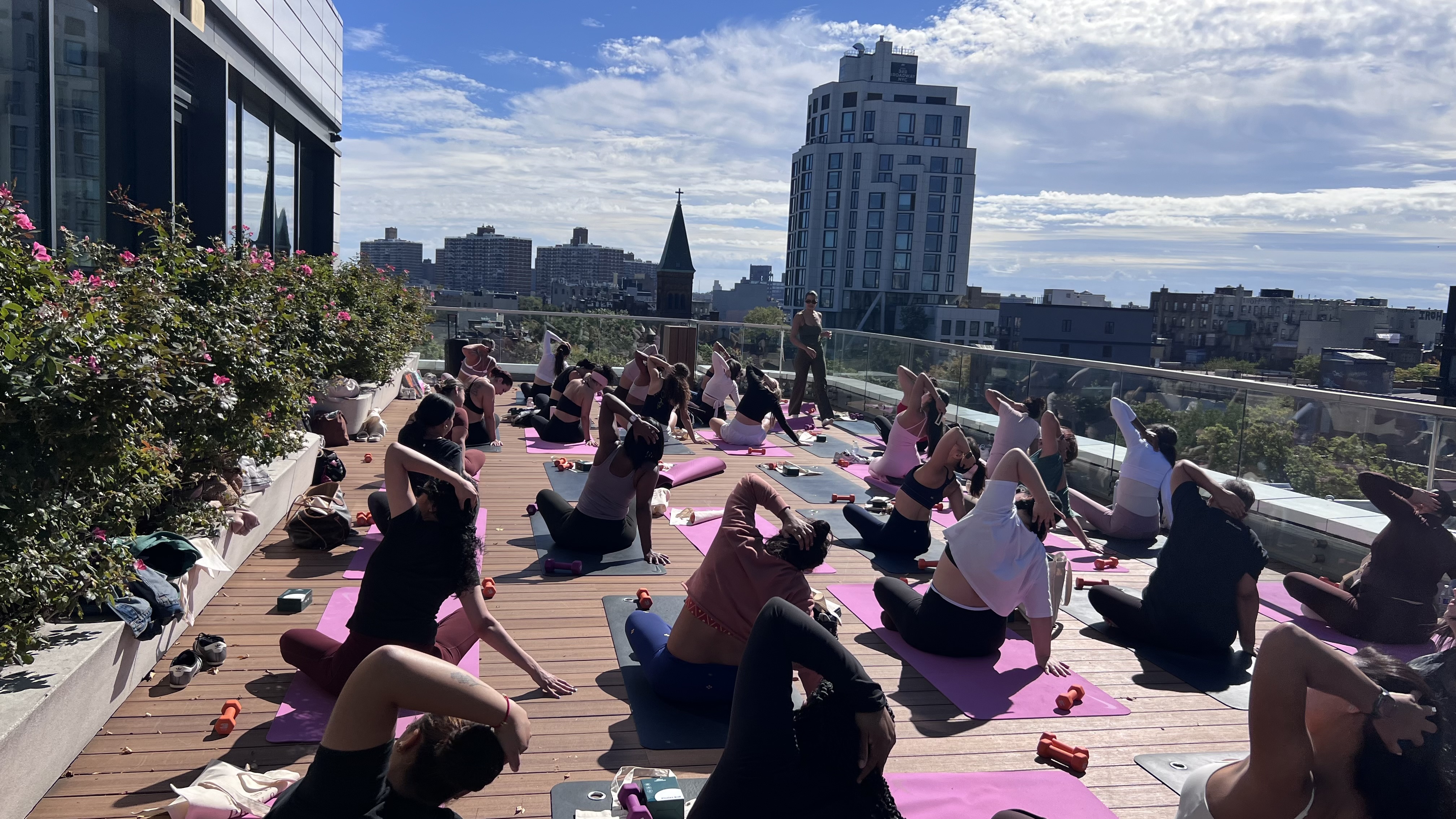 Women gathered in a wellness studio for movement and breathwork