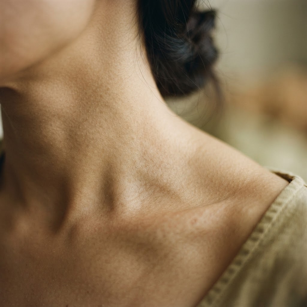 a natural skin close-up in warm amber light
