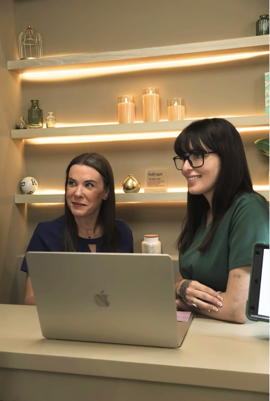 ReNuMED Aesthetics clinical aesthetic team consultation at the desk in Ocoee medspa