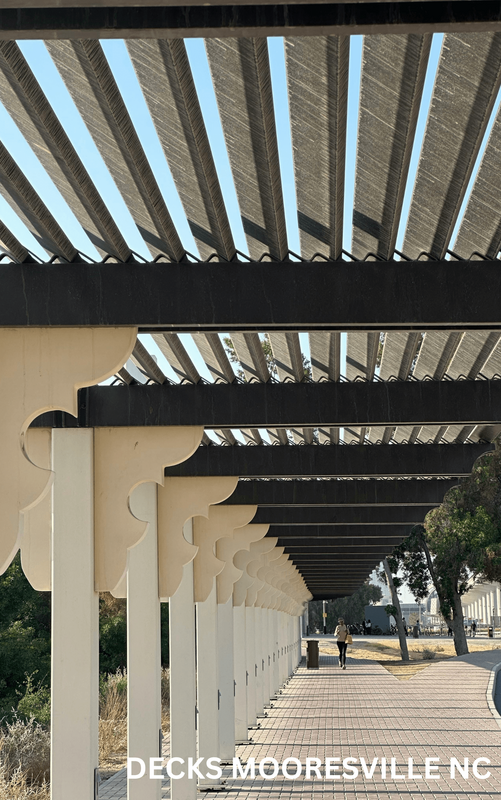 Pergola in black wood and white pillars
