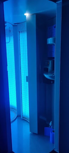 The stand-up UV Sun Shower booth at The Transformation Rooms Kirkby Stephen
