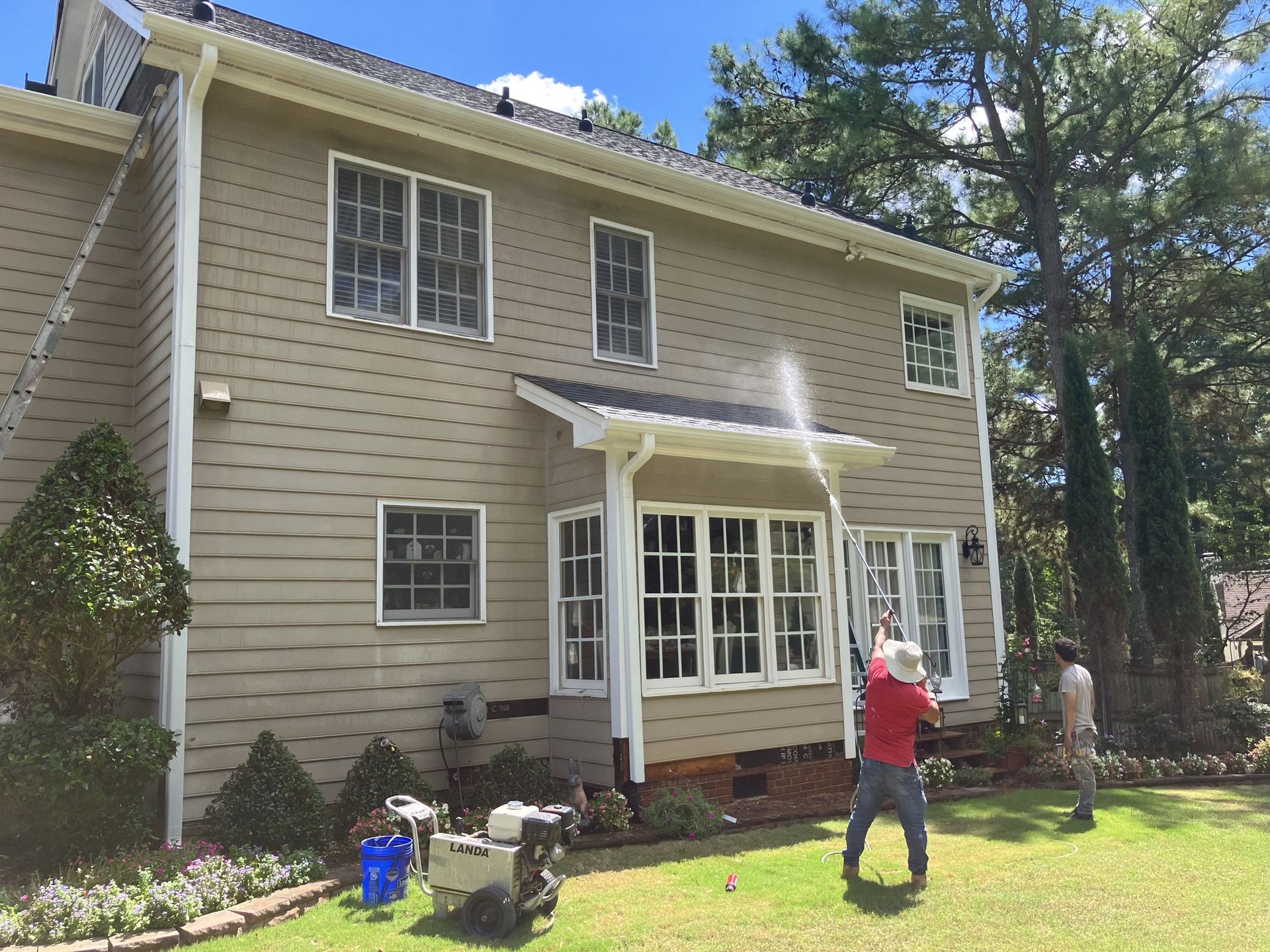 Exterior prep — pressure washing before painting