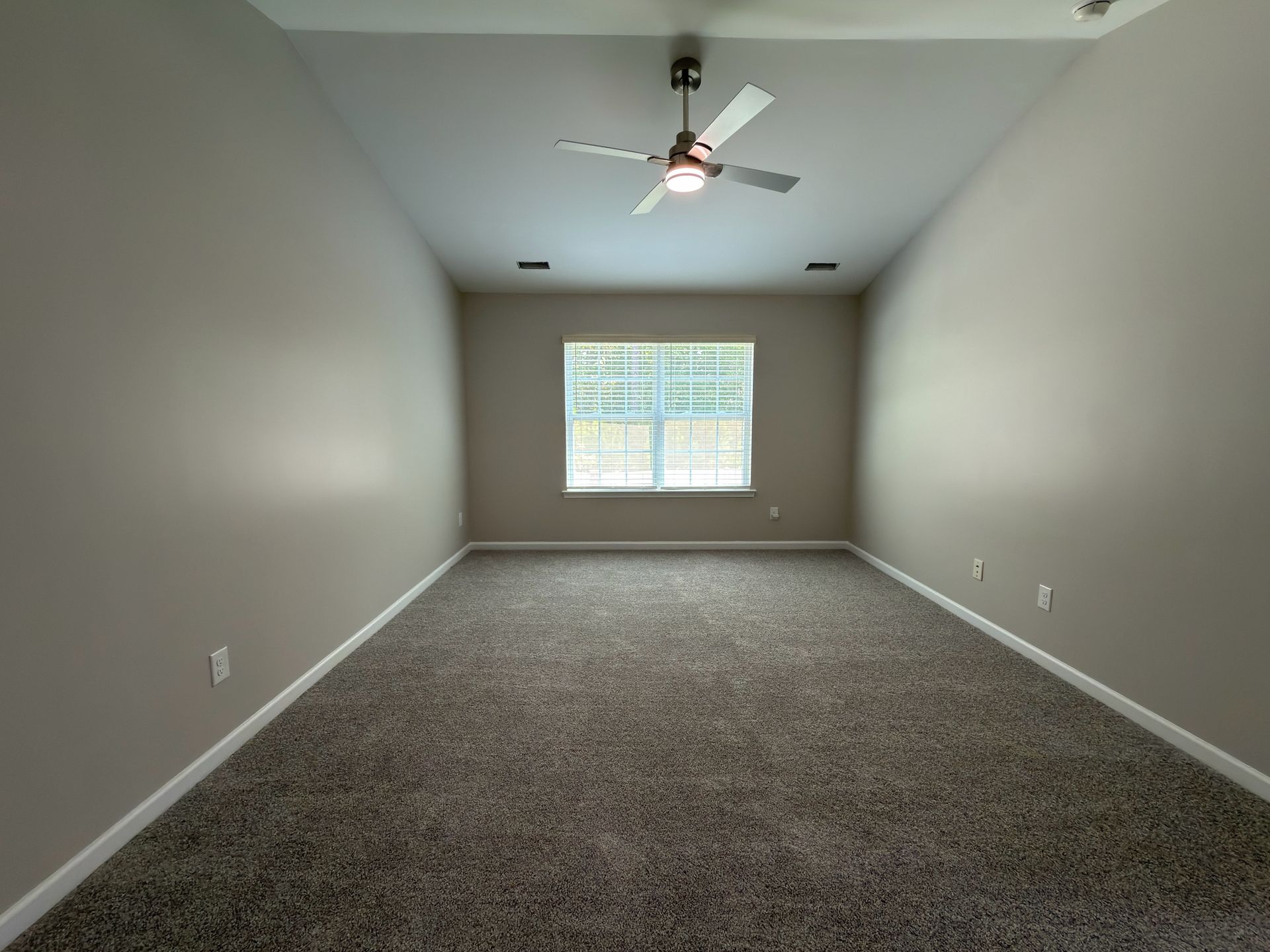 Broad Valley second bedroom in Charlotte after paint and new carpet