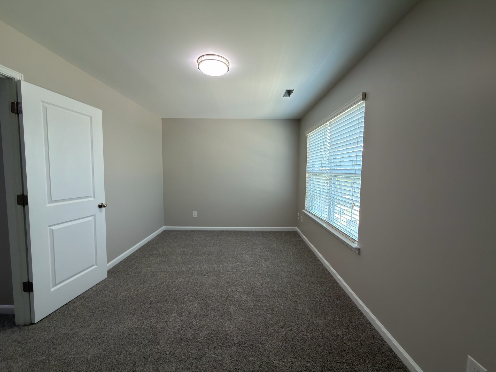 Broad Valley bedroom in Charlotte after paint and new carpet