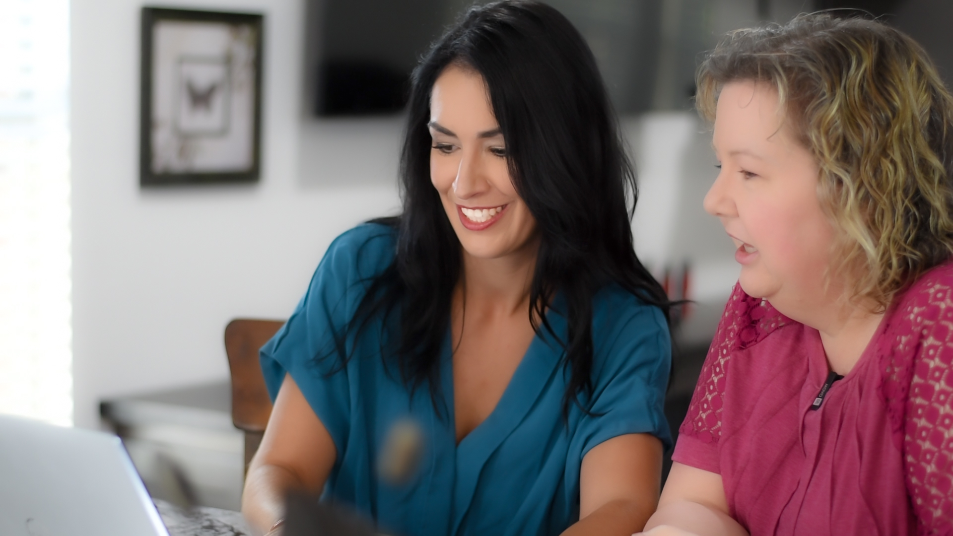 Marta reviewing design standards with a client