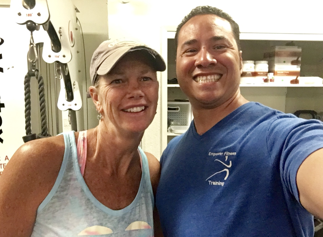 Empower Fitness trainer with client in downtown Visalia studio