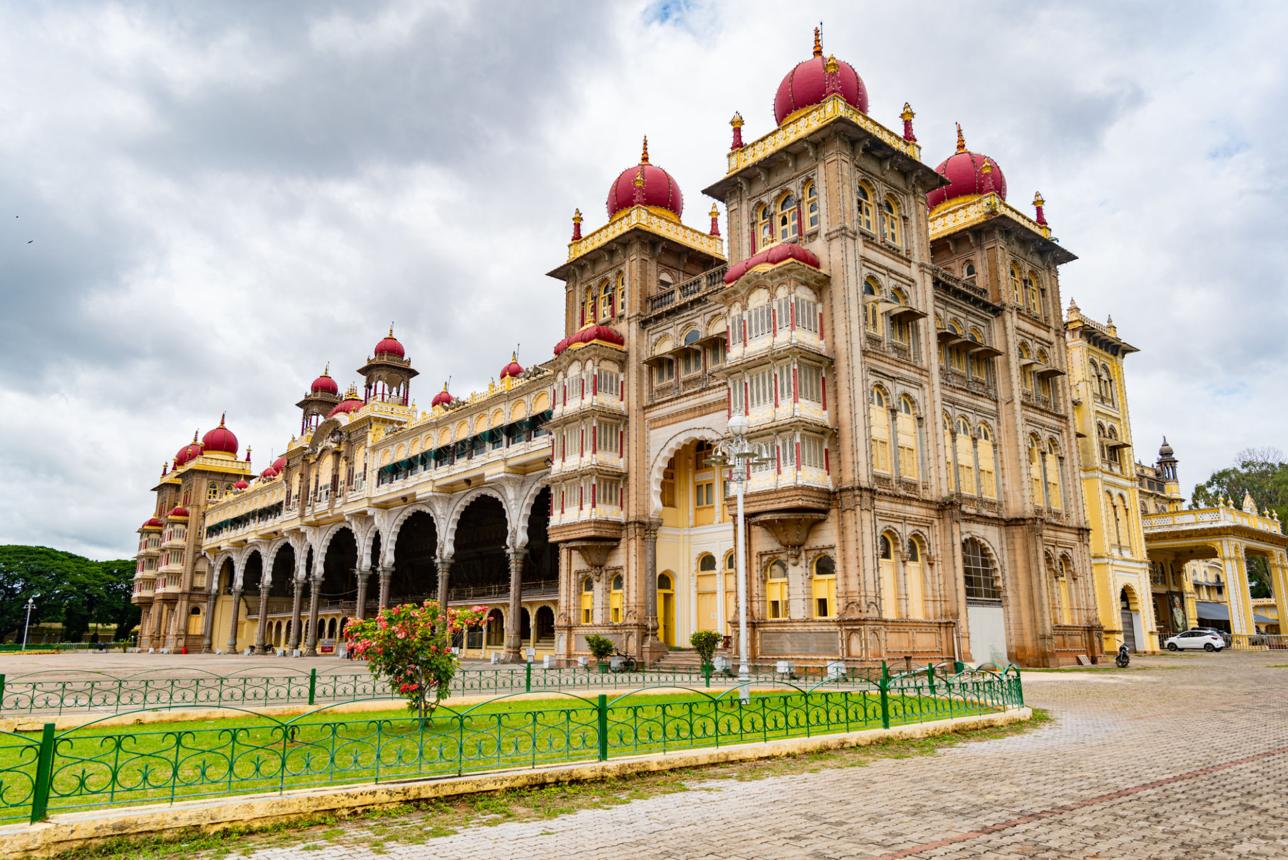 Mysore Palace illuminated at dusk, Mysore, Karnataka